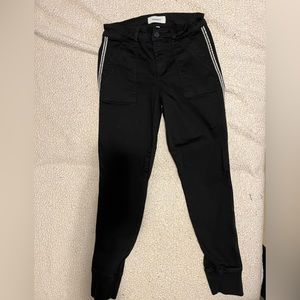 Level 99 black pants with white strip on side